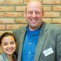 Guests posing and smiling together at Scholarship Dinner 2019.